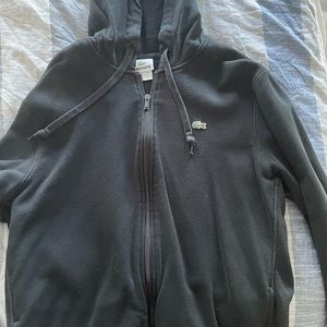 Lacoste black zip up hoodie. Size 5 which is men’s medium